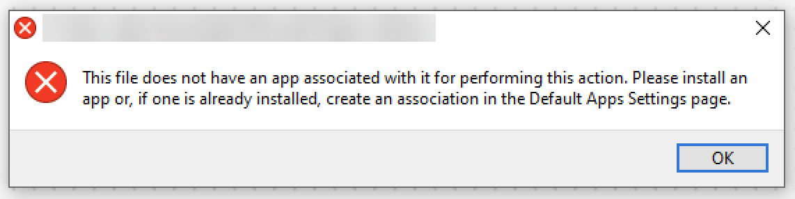 A Windows error message that notifies the user that a file does not have an associated app for opening it. The message suggests installing an app or creating an association through the Default Apps Settings page. There is an OK button in the lower right to close the message.