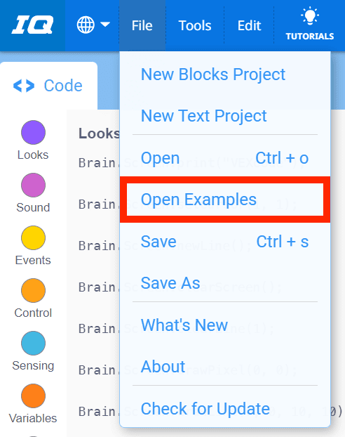 VEXcode IQ Toolbar with the File menu open and the Open Examples option highlighted. Open Examples is the fourth option in the menu, below New Blocks Project, New Text Project, and Open.