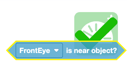Eye found object block hovering over the Monitor icon in the Workspace. A green arrow can be seen overtop of the Monitor icon.