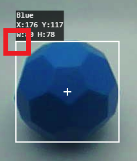 Egy kék Buckyballt egy látórendszer követ. Az objektumot fehér körvonal veszi körül, a körvonalon belül pedig egy középen fehér kereszt található. A bal felső címke az objektum színét kékként jelzi, X:176, Y:117 koordinátákkal és W:80, H:78 méretekkel. Egy kis piros négyzet kiemeli az objektum bal felső sarkát.