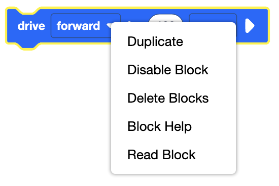 VEXcode GO Drive blokam tiek parādīts ar atvērtu konteksta izvēlni. Opcijas no augšas uz leju ir rakstītas Dublēt, Atspējot bloku, Dzēst blokus, Bloķēt palīdzību un Lasīšanas bloku.
