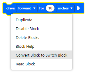 Jízda pro blok v pracovním prostoru VEXcode EXP s otevřenou kontextovou nabídkou. Je vybrána možnost Převést blok na přepínací blok.