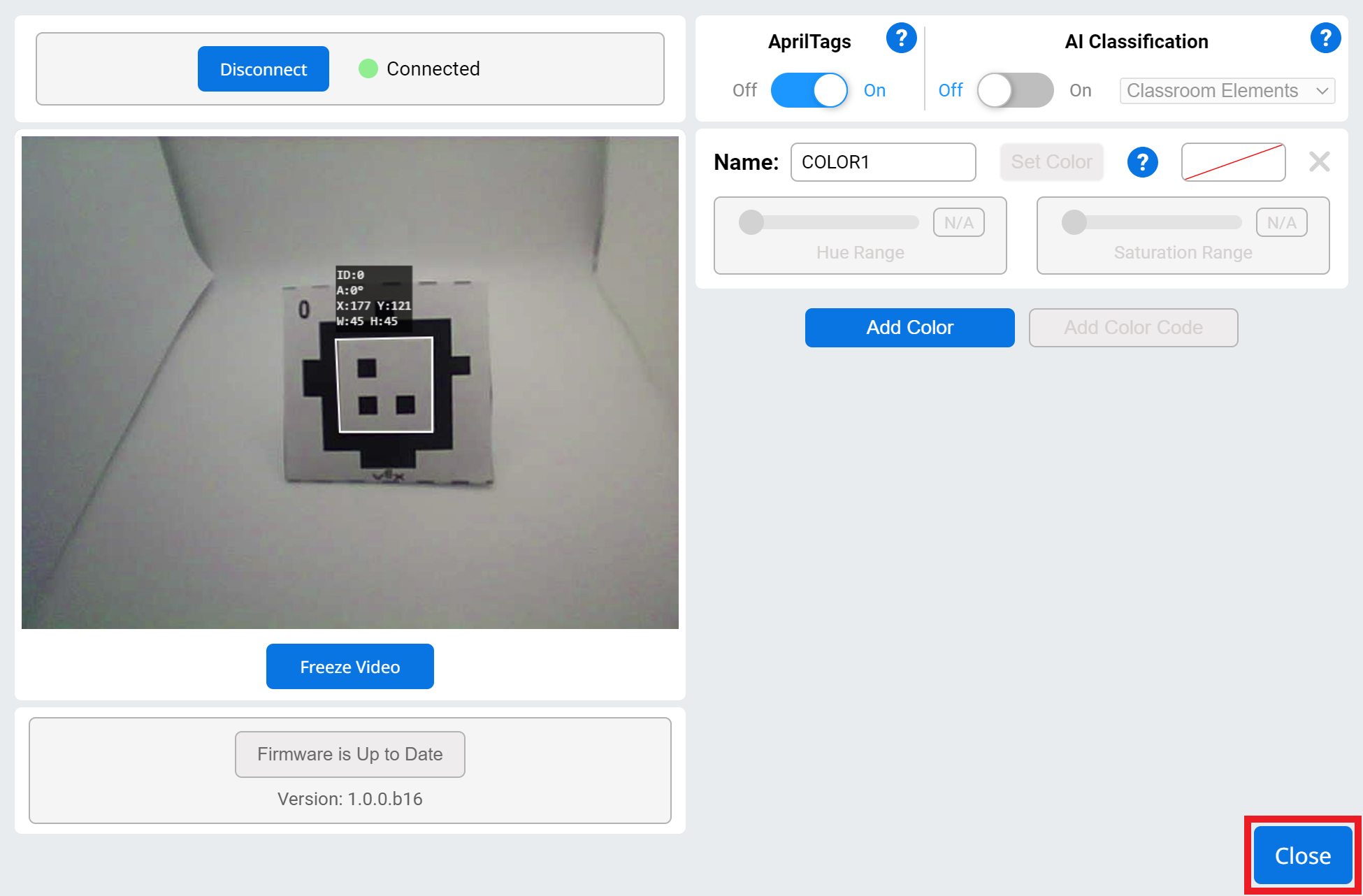 AprilTags опциясы қосылған және сенсордың бейне арнасында анықталған AprilTag бар AI Vision утилитасы. Жабу түймесі төменгі оң жақ бұрышта бөлектелген.