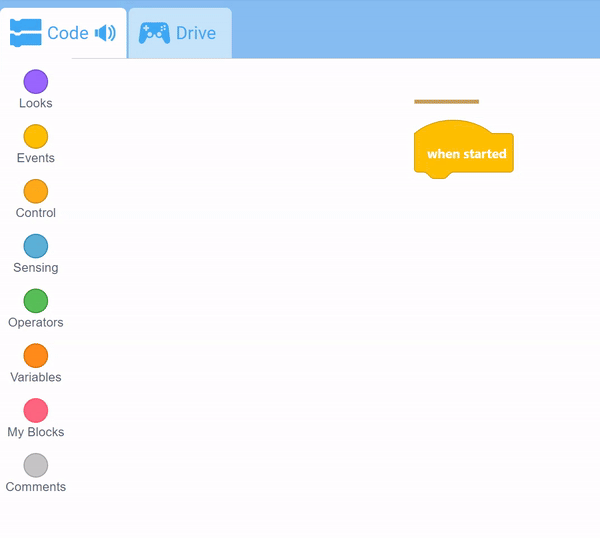 키보드를 사용하여 작업 공간에서 노란색 커서 막대를 움직이는 VEXcode GO 인터페이스입니다.
