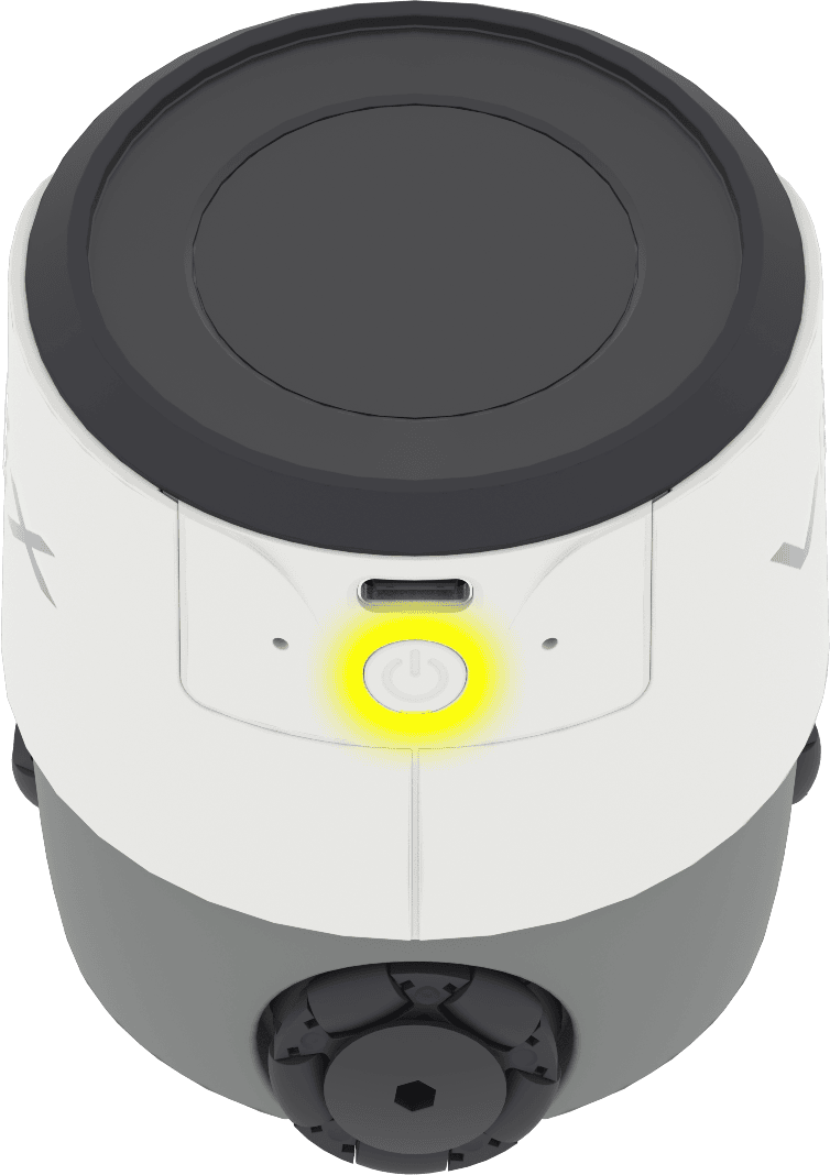 The back of the robot with the power button called out. The button is on the back of the robot beneath the port for a USB-C cable.