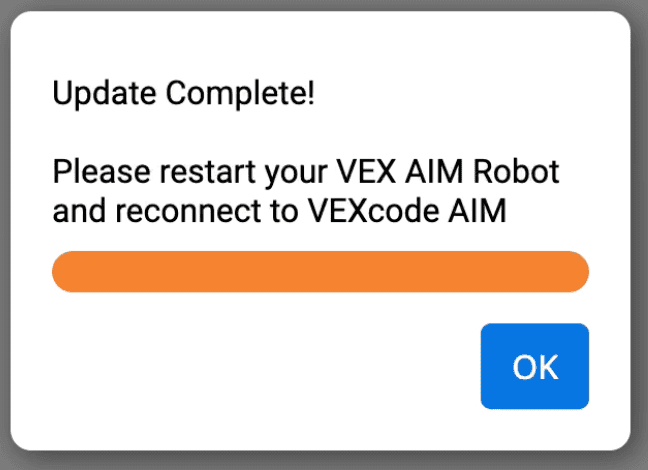 A completed progress bar is shown and the prompt reads Update Complete! Please restart your VEX robot and reconnect to VEXcode AIM.
