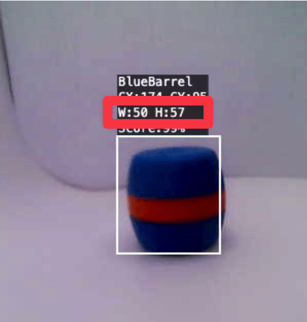 A Blue Barrel being tracked by a vision system. A white outline surrounds the object, with a centered white cross inside the outline. The top-left label indicates the object's as a Blue Barrel, along with center coordinates CX:174, CY:95, and dimensions W:50, H:57.
