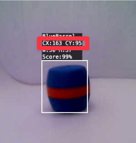 Un Blue Barrel monitorato da un sistema visivo. Un contorno bianco circonda l'oggetto, con una croce bianca al centro all'interno del contorno. L'etichetta in alto a sinistra indica che l'oggetto è un barile blu, insieme alle coordinate del centro CX:163, CY:95 e alle dimensioni W:50, H:57.