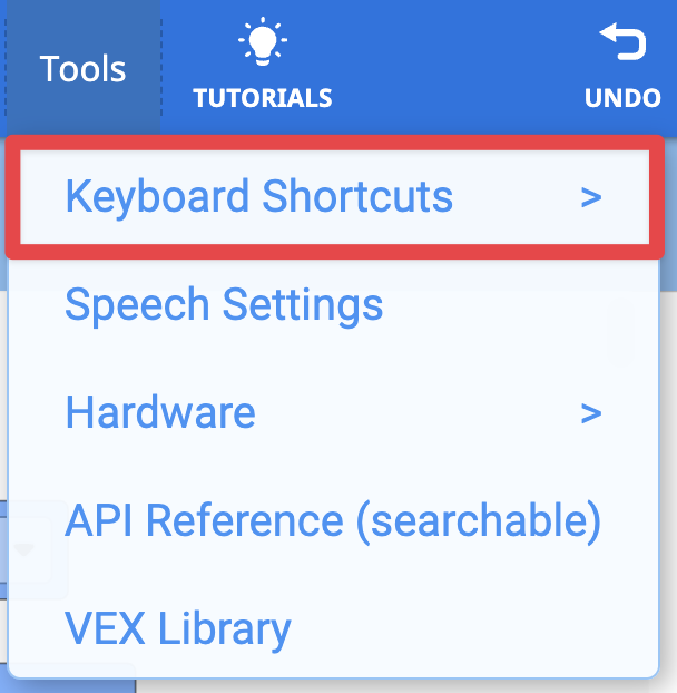 The Tools menu in the upper right hand corner of the VEXcode AIM Toolbar with the Keyboard Shortcuts option highlighted in a red box.