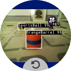 AI Vision Dashboard met een veld met drie objecten erop. De objecten worden voorzien van labels met de tekst Orange Barrel 99, Ball 99 en een AprilTag ID 0.