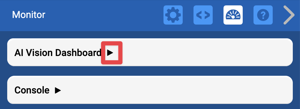 Černá šipka vpravo od záhlaví AI Vision Dashboard na monitoru.