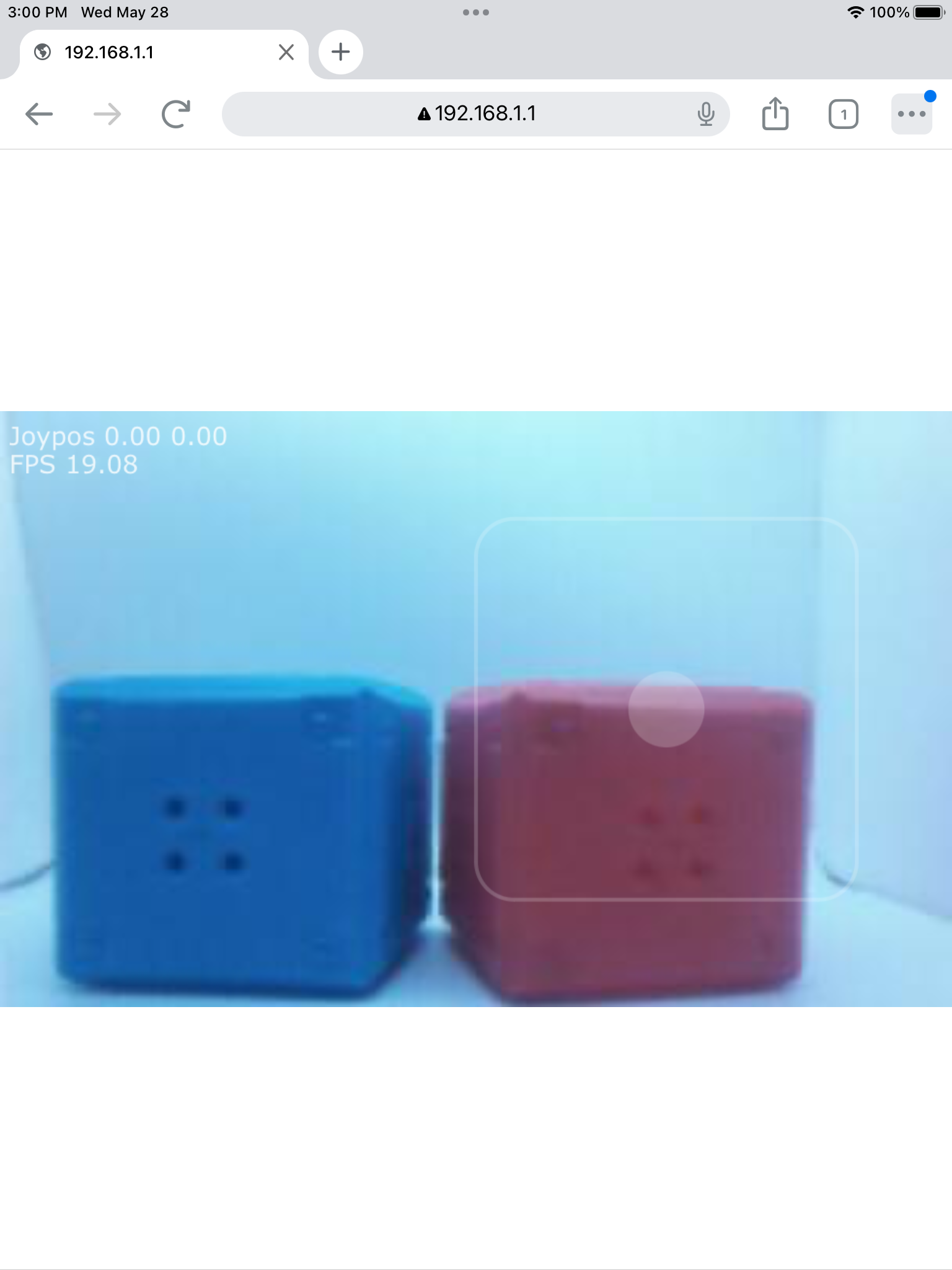 A live camera feed from the Vision Sensor displayed in a browser window after visiting 192.168.1.1. The feed shows a blue cube and a red cube side by side, with a faint targeting overlay and a framerate indicator showing 19.08 FPS in the corner.