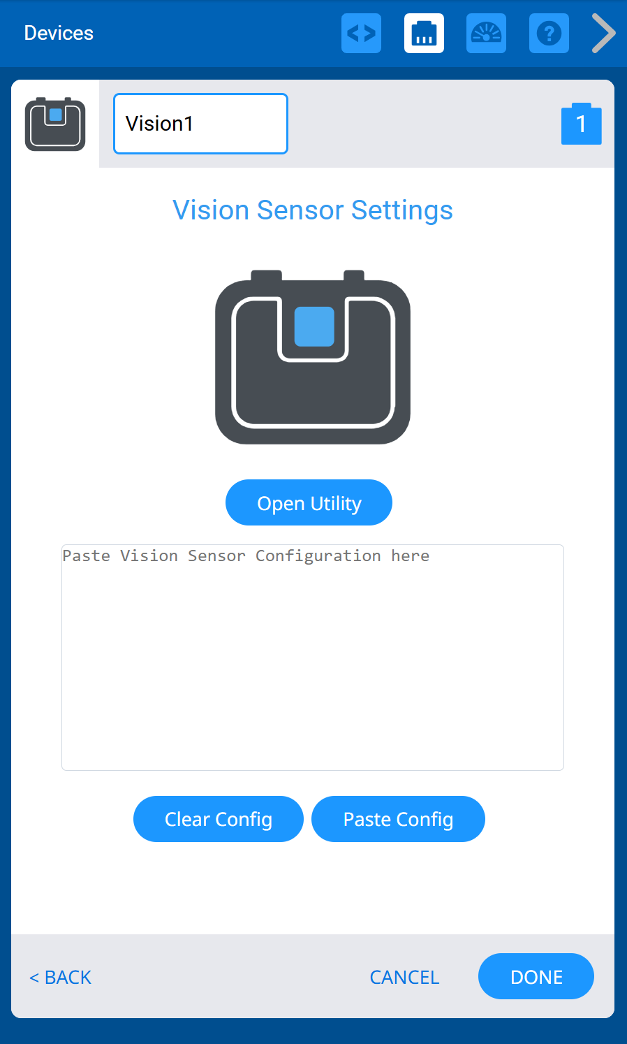 The Vision Sensor Settings screen appears after assigning a port. The sensor is labeled Vision1. A large Vision Sensor icon is shown, along with an Open Utility button. Below it is a configuration text area with buttons for Clear Config and Paste Config, and a DONE button to confirm setup.