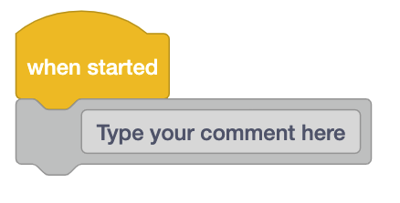 VEXcode EXP blocks project with a Comment block that has a saved message in its text field that reads Type your comment here.