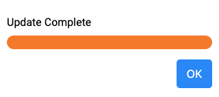 VEXcode EXP Update Complete prompt with a finished progress bar and an OK button below.