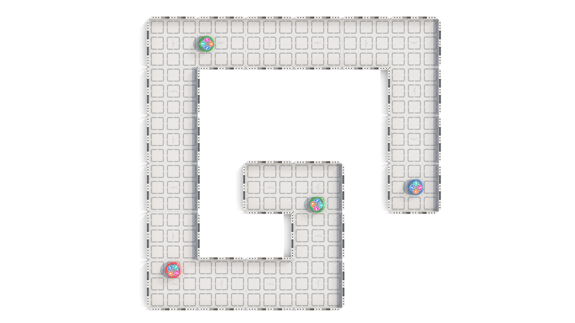 Vista superior de uma pista de corrida curva feita de telhas de campo e rodeada de muros. São mostrados vários 123 robôs a viajar ao longo da pista de corrida.