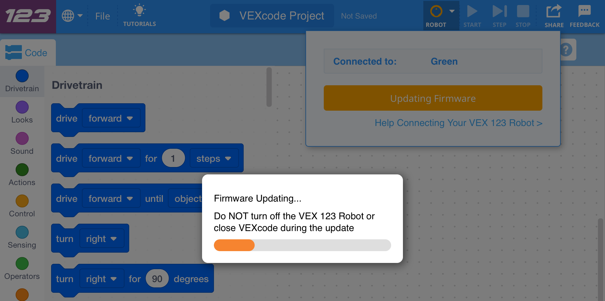 123 로봇이 연결된 VEXcode 123의 스크린샷과 펌웨어 업데이트 중이라는 팝업 창이 나타납니다. 업데이트 중에는 VEX 123 로봇을 끄거나 VEXcode를 닫지 마세요.