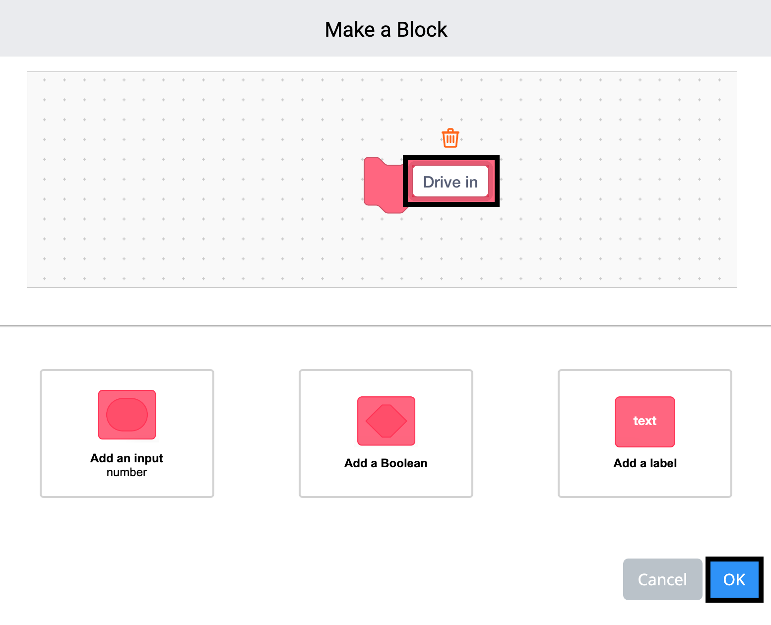 VEXcode 123 の「ブロックの作成」メニューが開き、ブロックの名前が「Drive in」に変更され、強調表示されています。 右下の青い「OK」ボタンがハイライト表示されます。