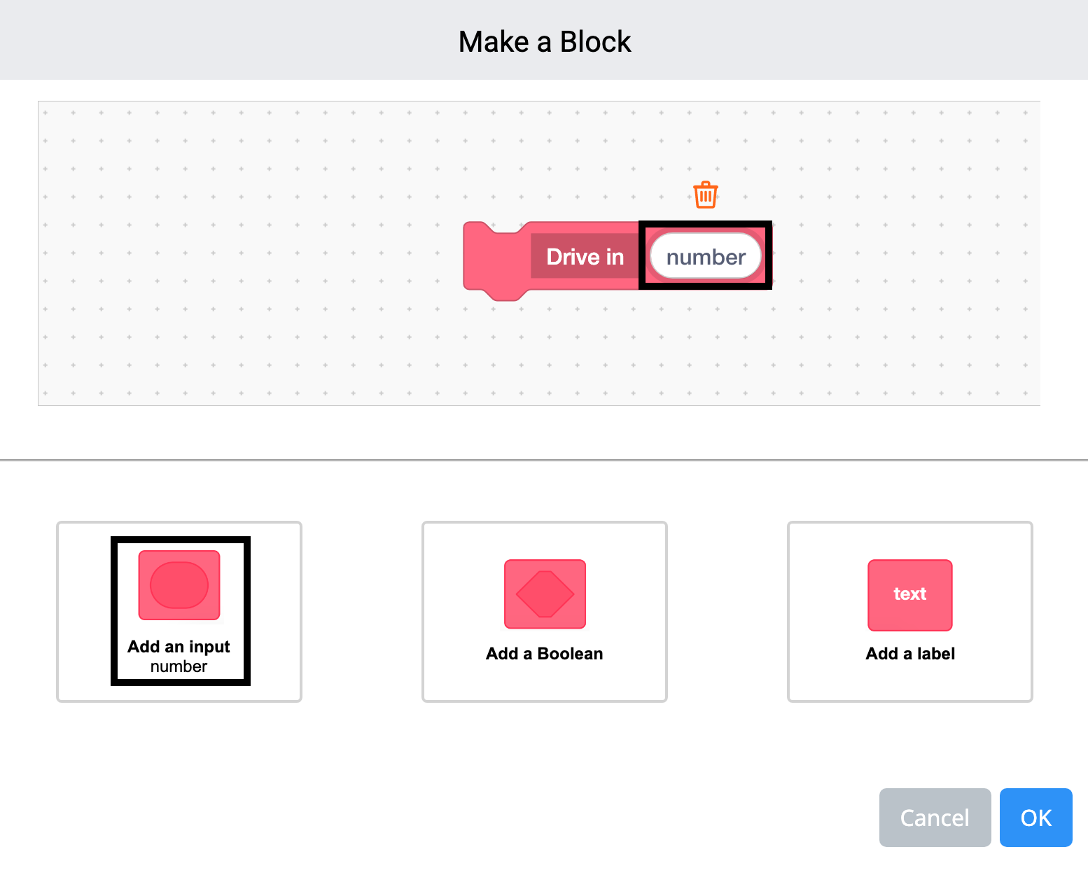VEXcode 123 El menú Make a Block está abierto y el nombre del bloque está configurado como Drive in. Se ha agregado un campo de entrada de número al bloque y ahora está resaltado.