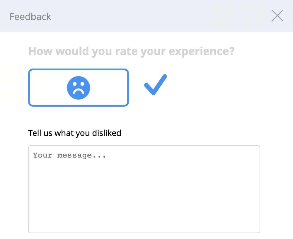 Janela de feedback do VEXcode 123 após o botão de classificação negativa ter sido selecionado, mostrando uma cara de desaprovação.