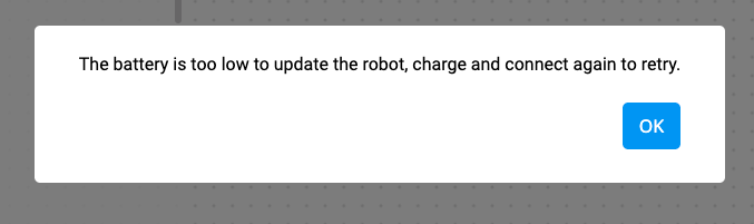 VEXcode 123 -virhekehote, jossa lukee Akku on liian alhainen robotin päivittämiseen, lataamiseen ja yhdistämiseen uudelleen yrittämistä varten. Kehotteen alla on OK-painike.