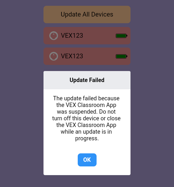 Fehlermeldung der VEX Classroom App mit dem Text „Update fehlgeschlagen“: Das Update ist fehlgeschlagen, weil die VEX Classroom App angehalten wurde. Schalten Sie dieses Gerät nicht aus und schließen Sie die VEX Classroom App nicht, während ein Update läuft. Unter der Eingabeaufforderung befindet sich eine blaue Schaltfläche „OK“.