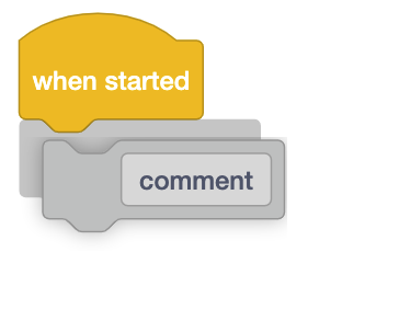 Espaço de trabalho de blocos VEXcode EXP que mostra um bloco de comentários a ser arrastado para uma pilha de blocos.