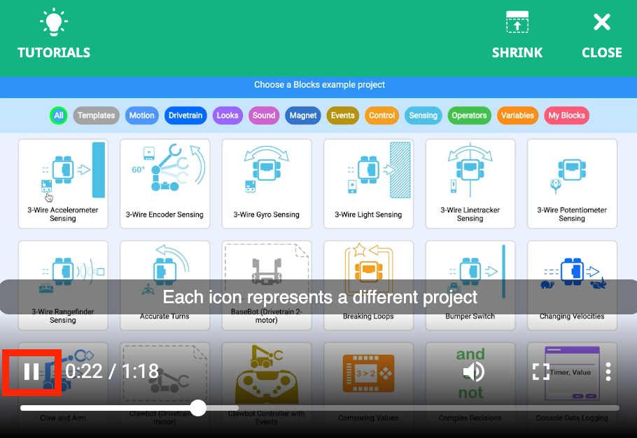Video tutorial terbuka, dan ikon jeda video kecil di atas bilah kemajuan disorot.