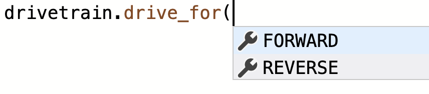 VEXcode EXP Python Workspace con un menú desplegable de comandos sugeridos. El comando drivetrain.drive_for se ha escrito con un perenthesis inicial, y los parámetros para esa función están disponibles en el menú. La primera opción de parámetro se lee hacia adelante.