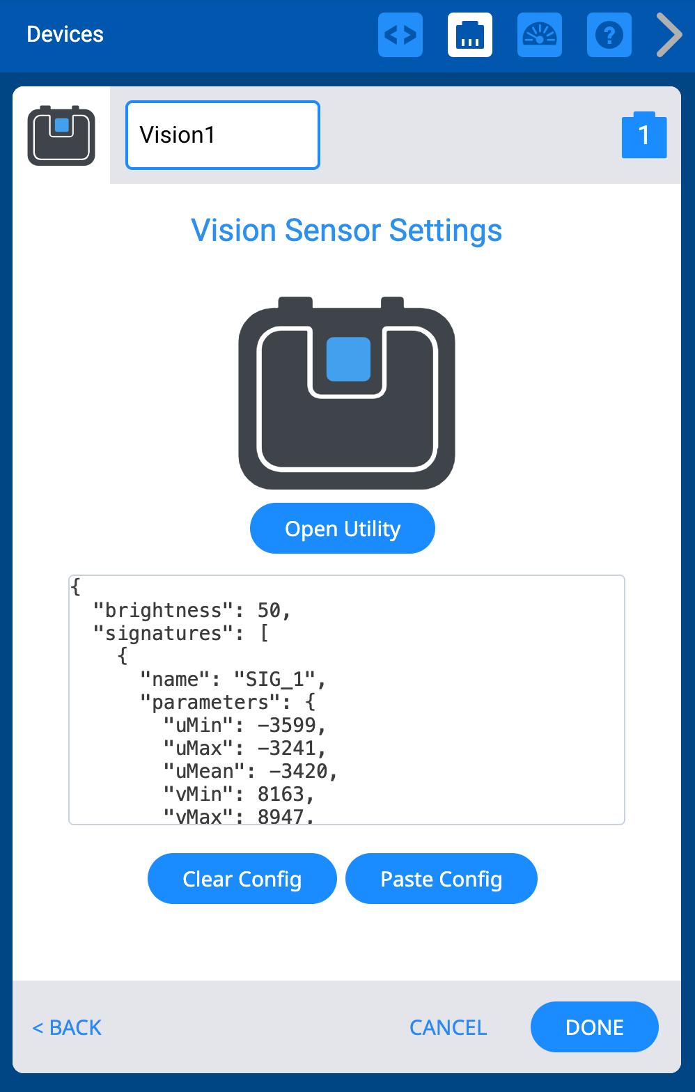 La pantalla de configuración del sensor de visión con un código de configuración personalizado pegado en el campo de texto del menú.