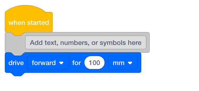 VEXcode-Projekt mit einem Kommentarblock, in dessen Textfeld die gespeicherte Nachricht „Fügen Sie hier Text, Zahlen oder Symbole hinzu“ steht.