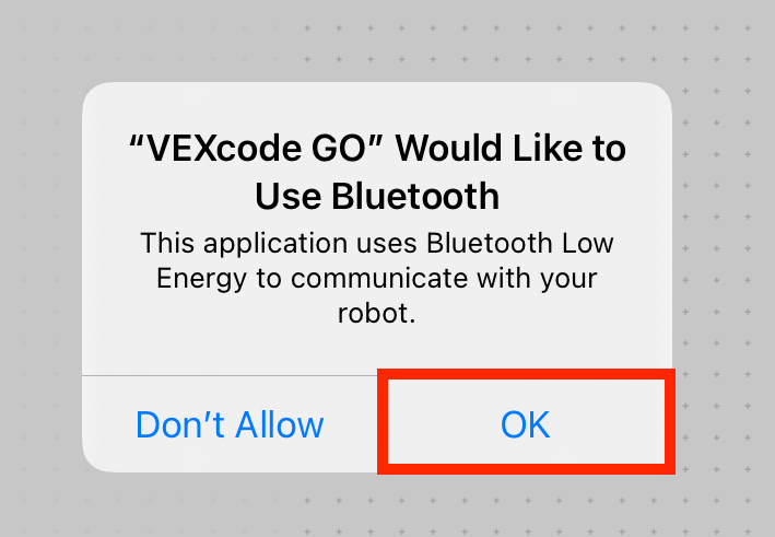 ब्लूटूथ अनुमति संकेत, जिसमें लिखा है VEXcode GO ब्लूटूथ का उपयोग करना चाहेगा, यह एप्लिकेशन आपके रोबोट के साथ संचार करने के लिए ब्लूटूथ लो एनर्जी का उपयोग करता है। प्रॉम्प्ट के नीचे एक अनुमति न दें बटन और एक ठीक बटन है।
