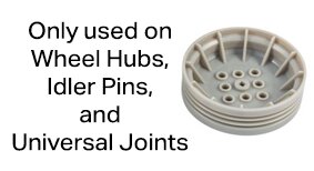 Bagian Hub Roda berukuran 64mm berwarna abu-abu sedang dengan teks di sebelahnya yang berbunyi Hanya digunakan pada Hub Roda, Pin Idler, dan Sambungan Universal.