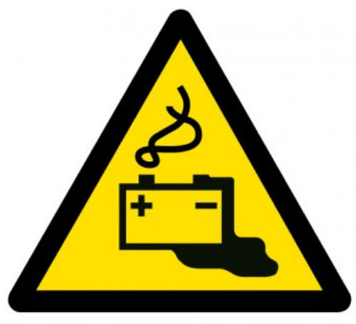 Žlutý symbol nebezpečí s diagramem kouřící a nefunkční elektrické součástky.
