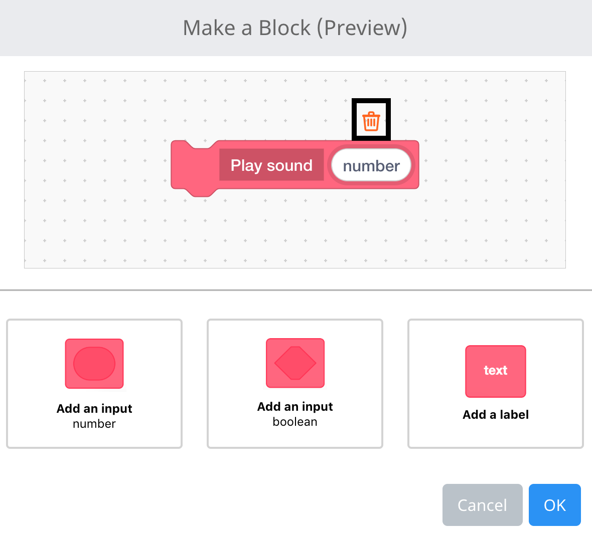 Het menu 'Maak een blok' van VEXcode IQ is geopend en de naam van het blok is ingesteld op 'Geluid afspelen'. Er is een numeriek invoerveld toegevoegd aan het blok en het Wissen-pictogram boven het invoerveld is gemarkeerd.