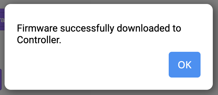 تظهر رسالة موجه لتنزيل البرنامج الثابت VEXcode IQ مع رسالة تفيد بأنه تم تنزيل البرنامج الثابت بنجاح إلى وحدة التحكم. يوجد زر موافق في الأسفل.