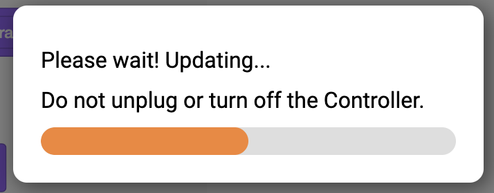Aparece uma mensagem de atualização do VEXcode IQ com uma barra de progresso e a instrução "Por favor, aguarde!". Durante a atualização, não desligue nem desligue o controlador.