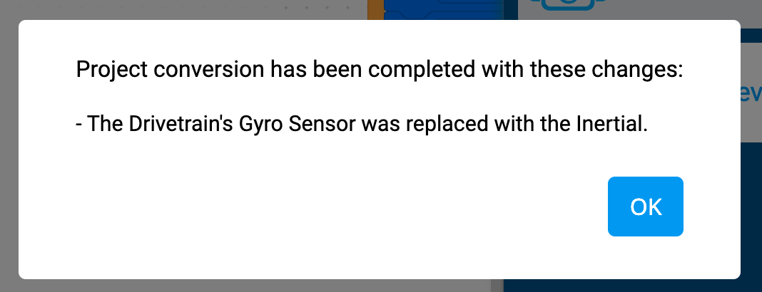 Prompt Konversi Proyek VEXcode IQ yang berbunyi Konversi proyek telah selesai dengan perubahan ini. Sensor Gyro Drivetrain digantikan dengan Inersia. Ada tombol OK di bawah.