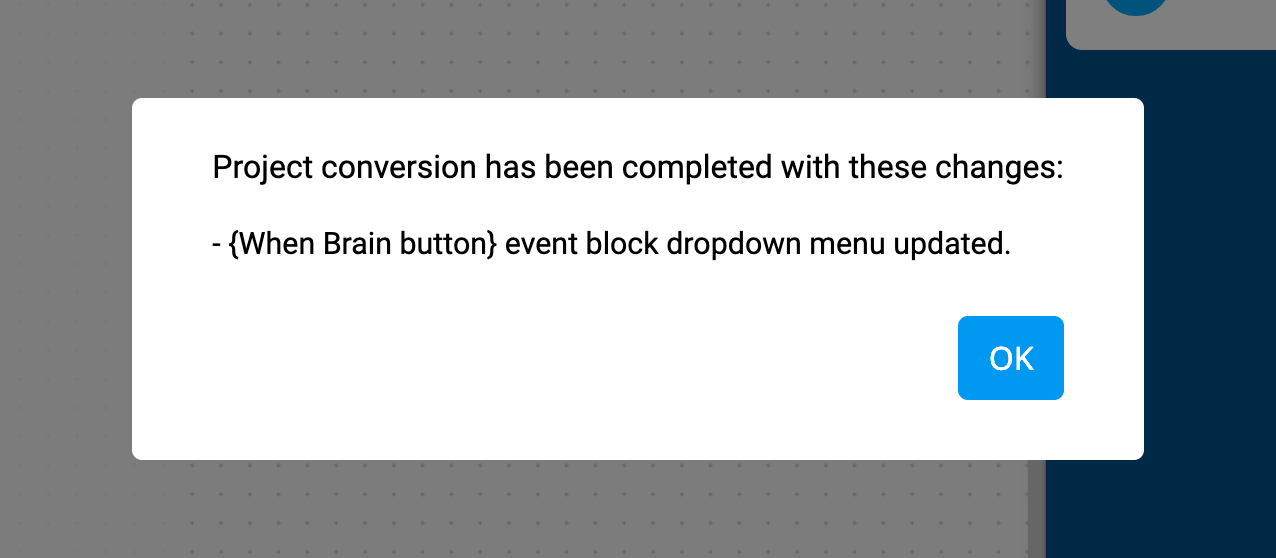 Il prompt di conversione del progetto VEXcode IQ riporta che la conversione del progetto è stata completata con queste modifiche. Aggiornato il menu a discesa del blocco eventi {When Brain button}. In basso c'è il pulsante OK.