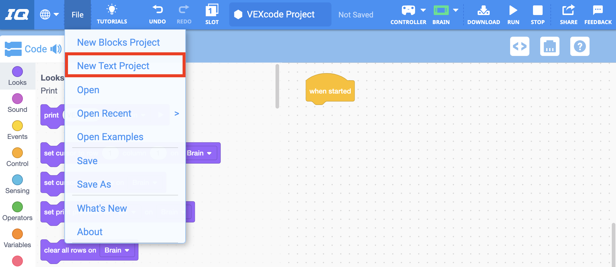 Thanh công cụ VEXcode IQ với menu File mở và tùy chọn New Text Project được tô sáng. Dự án văn bản mới là tùy chọn thứ hai trong menu, bên dưới Dự án khối mới.