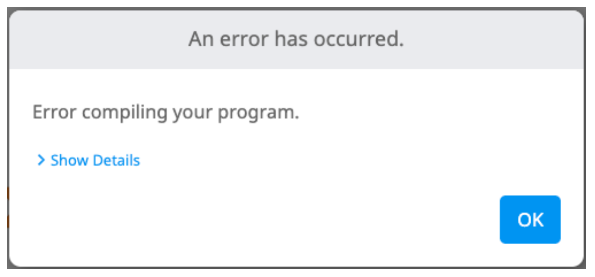 Programınız derlenirken hata oluştu mesajını okuyan VEXcode IQ hata istemi. İstemin altında Ayrıntıları Göster düğmesi ve sağ alt köşesinde mavi bir Tamam düğmesi var.