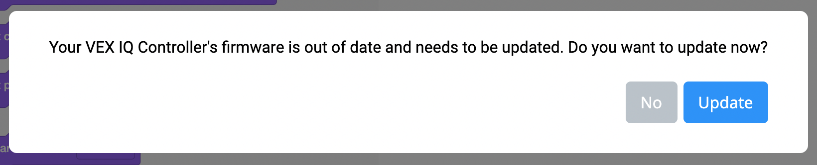 Monit o nieaktualnym oprogramowaniu układowym VEXcode IQ z komunikatem: Oprogramowanie układowe kontrolera VEX IQ jest nieaktualne i wymaga aktualizacji. Czy chcesz dokonać aktualizacji teraz? Poniżej znajdują się dwa przyciski: pierwszy z nich to Nie, a drugi to Aktualizuj.