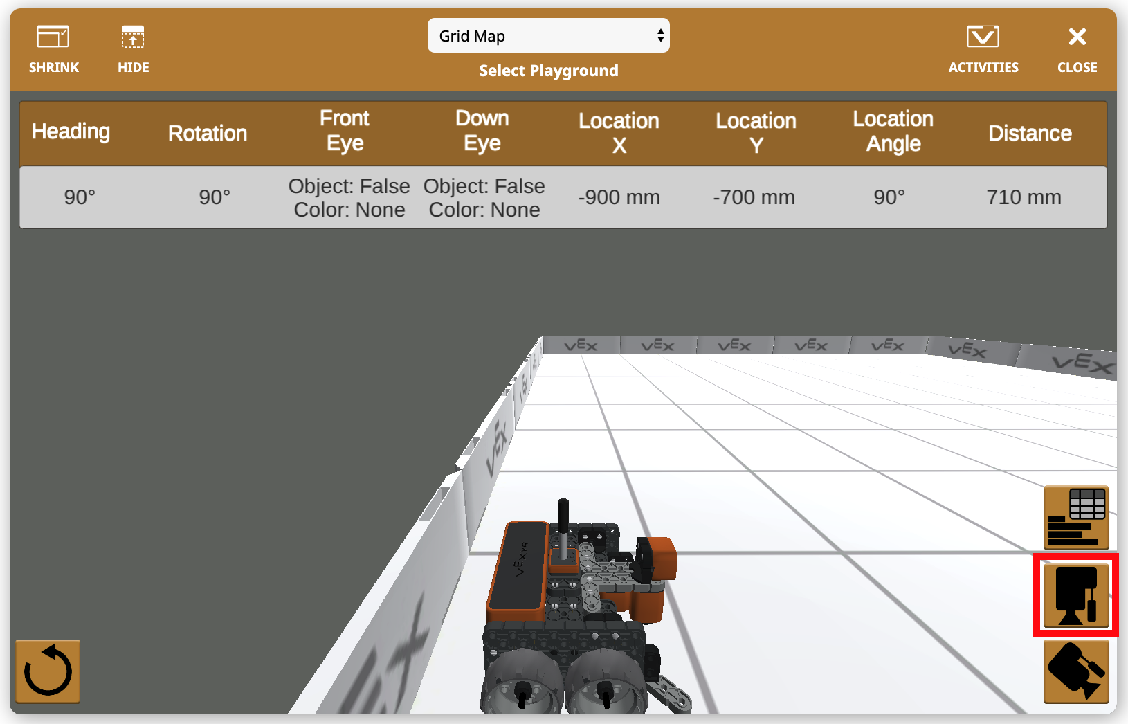 Imagen de la vista superior de una interfaz de cámara virtual en VEXcode VR, que muestra características para programar y probar código en un entorno de robot simulado, con el objetivo de mejorar la educación STEM y las habilidades de codificación.