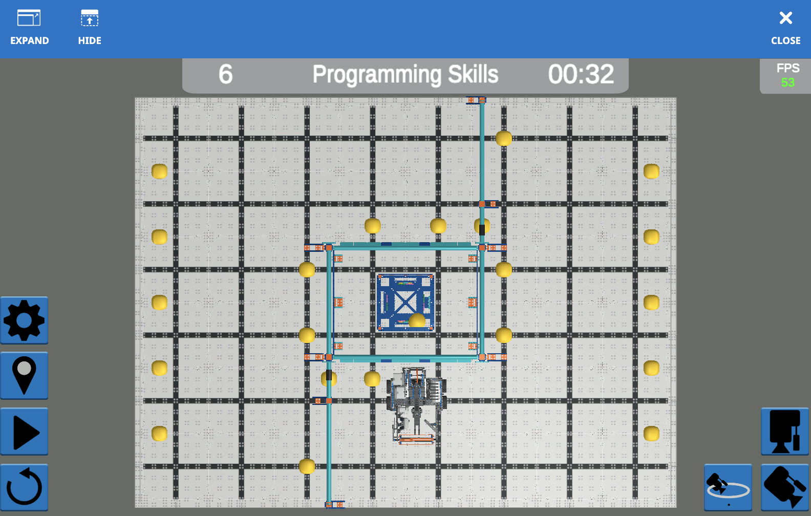 Screenshot dell'interfaccia VR di VEXcode che mostra l'ambiente di programmazione per la sfida VIQC Pitching In (2021-2022), con opzioni di codifica basate su blocchi e testo per l'apprendimento di concetti di codifica con un robot virtuale.