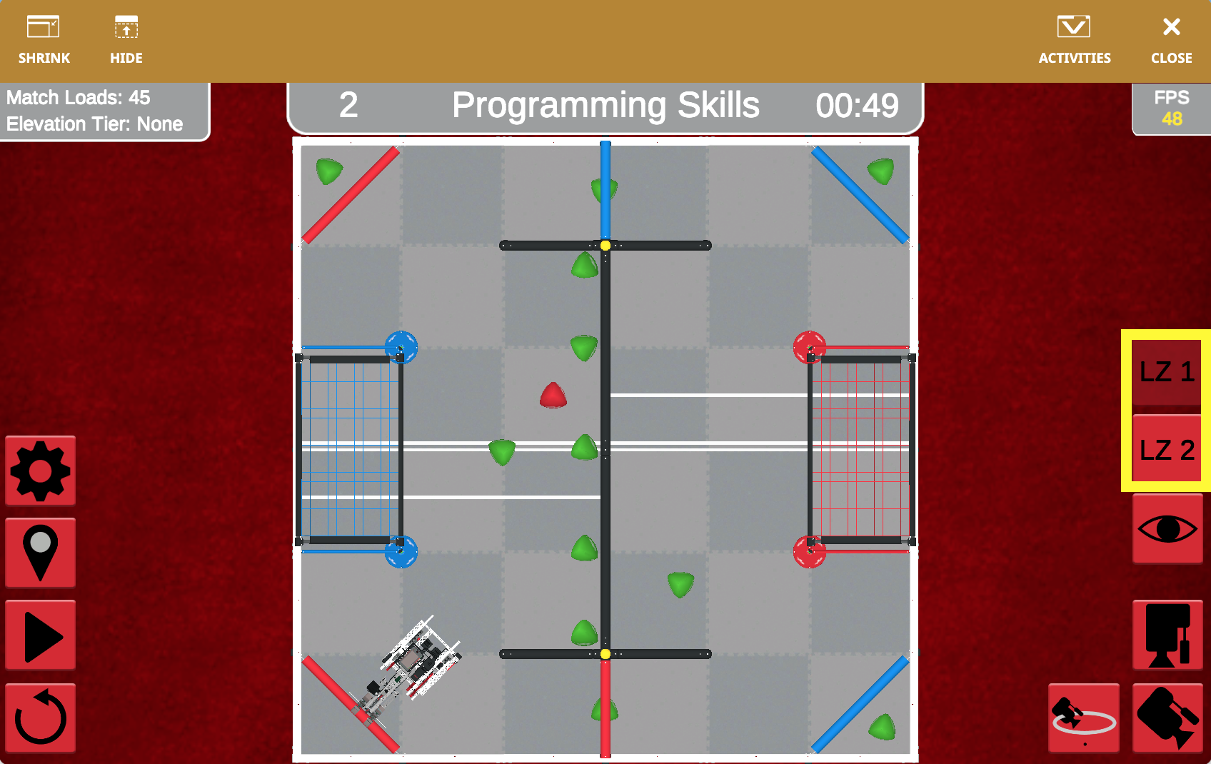 Diagramm, das den Spielfeldaufbau des VRC Over Under für die Saison 2023–2024 veranschaulicht und ausgewiesene Zonen und Hindernisse für VEXcode VR-Programmierherausforderungen zeigt.