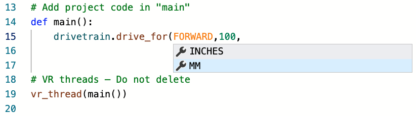 Zrzut ekranu przedstawiający proces dodawania jednostek miary w VEXcode VR, ilustrujący opcje milimetrów i cali w interfejsie kodowania. Obraz ten stanowi uzupełnienie samouczka dotyczącego wykorzystania VEXcode VR w celach edukacyjnych z zakresu kodowania i robotyki.