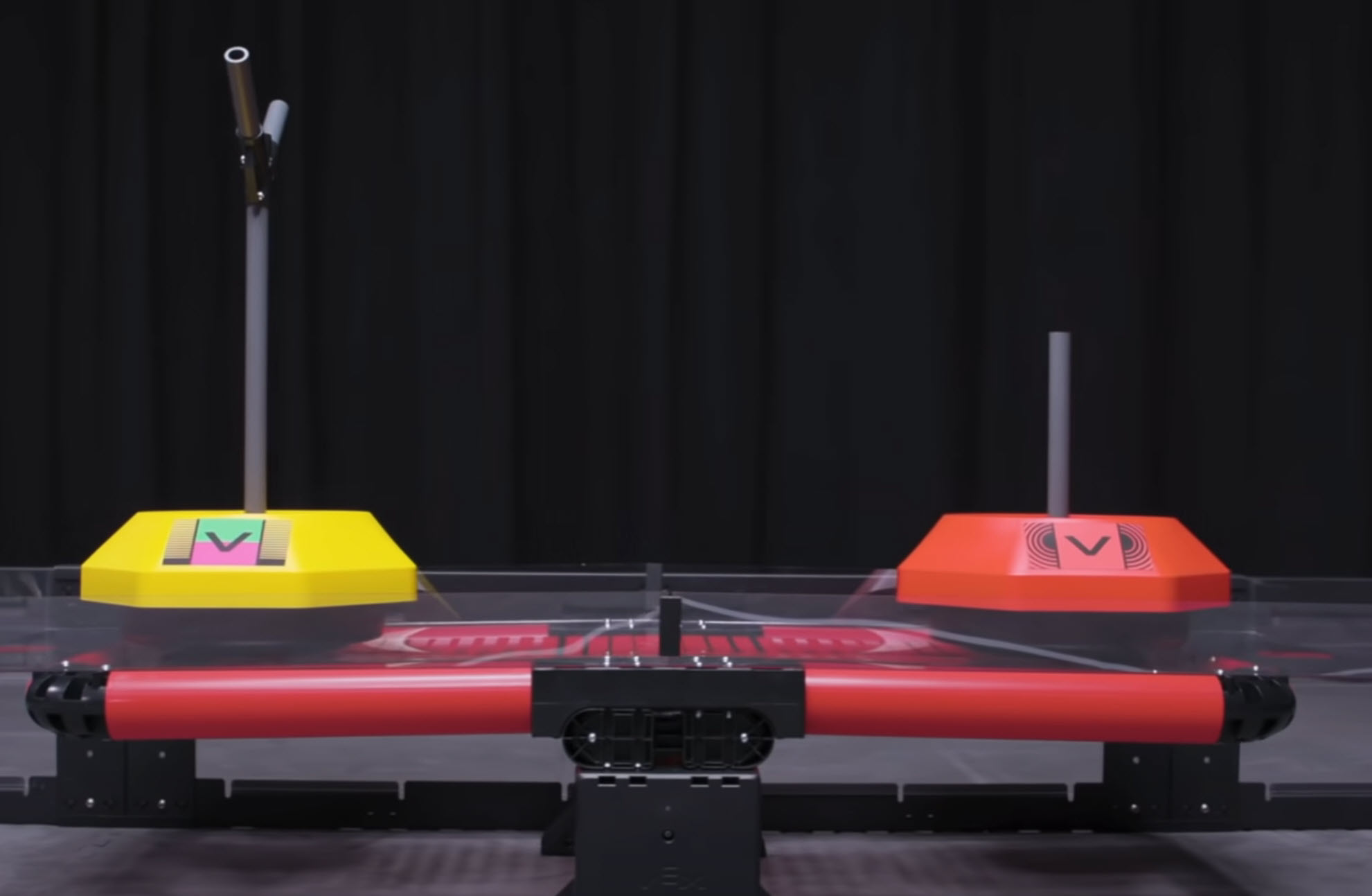 Diagram dat de componenten en ontwerpkenmerken van een V5-wedstrijdrobot illustreert, met verschillende onderdelen zoals motoren, sensoren en structurele elementen voor optimale prestaties in roboticawedstrijden.