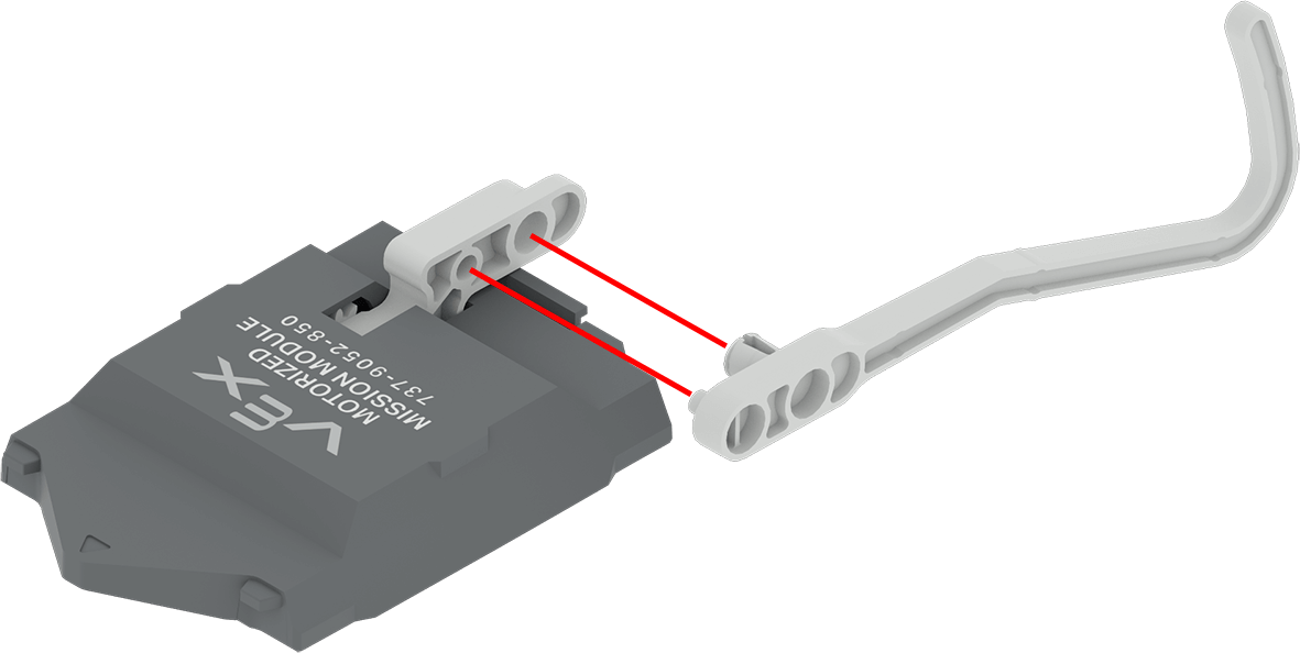 Diagram yang menunjukkan cara memasang kait Modul Misi Bermotor. Garis menunjukkan bahwa kait tersebut memiliki pin kecil yang pas pada lubang pin pada modul itu sendiri.