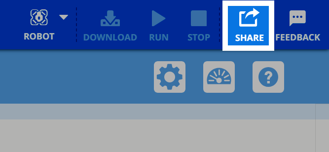 VEXcode इंटरफ़ेस में शेयर बटन को सफेद बॉर्डर से हाइलाइट किया गया है। इसे फीडबैक बटन के बगल में ऊपरी-दाहिने टूलबार में स्थित एक बॉक्स से निकलते हुए तीर द्वारा दर्शाया जाता है।