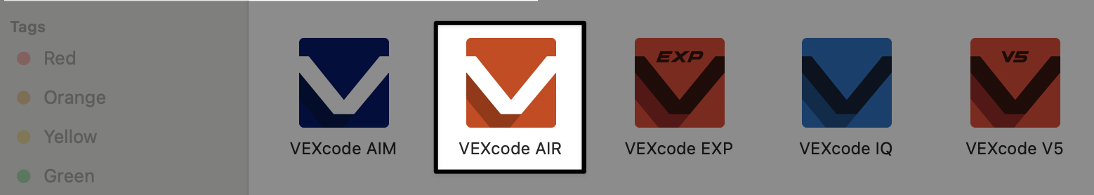 โฟลเดอร์แอปพลิเคชัน Mac ที่มีไอคอน VEXcode AIR สีส้มถูกเรียกออกมา